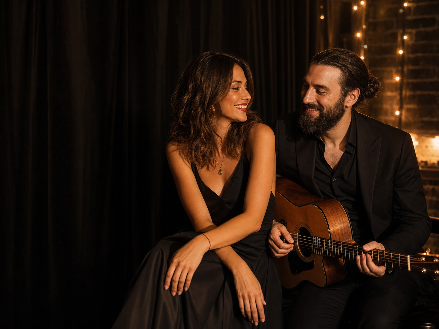 Jenny and Freddy together with an acoustic guitar